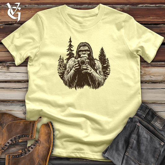 Sasquatch Capturing Snapshots Softstyle Tee